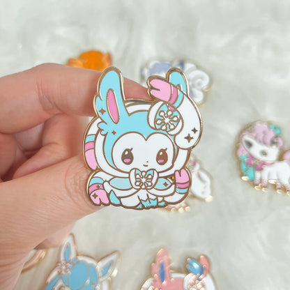 Sylveon (Shiny) – Winter Poke Enamel Pin Series by Mooncake Pin